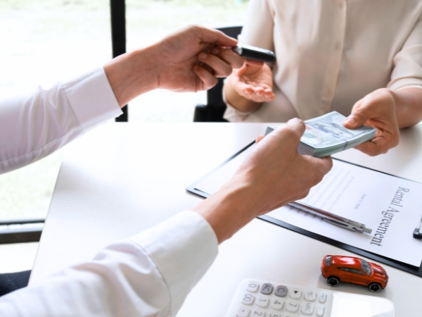 Customer Paying Car Rental Fees