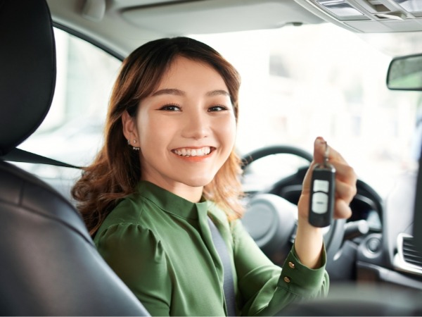 Woman Holding Car Keys