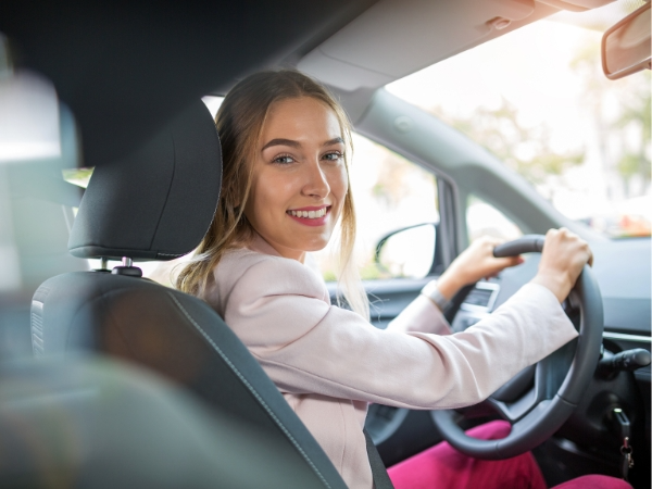 Woman Driving a Car